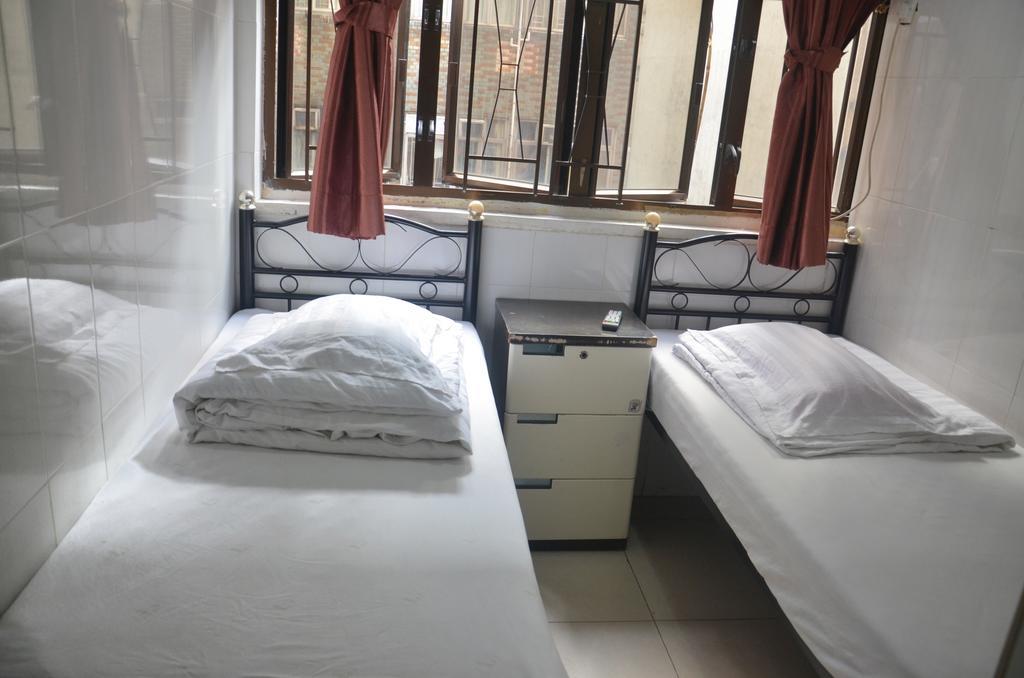 Tai Hao Hostel هونغ كونغ الغرفة الصورة